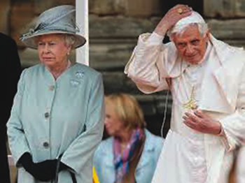 Queen Elizabeth II and Cardinal Ratzinger while he was still Pope Benedict XVI. 
