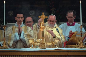 Pope Francis  incensing the altar cross.