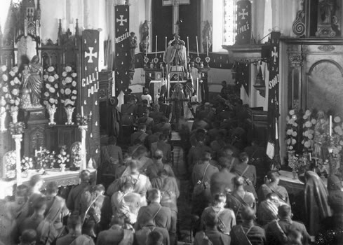 Soldiers commemorating All Souls’ Day in a church in Selle, France