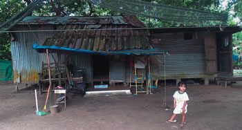 For many Burmese migrant families, homes are tin sheds