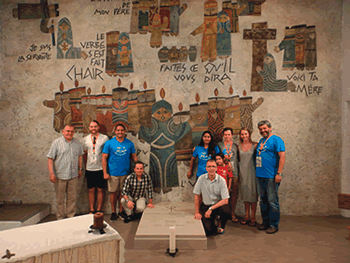 Fr Colin’s tomb at La Neylière, with Fr John Hannan, Society of Mary Superior General on the left, and General Assistant Fr Alejandro Munoz on the right