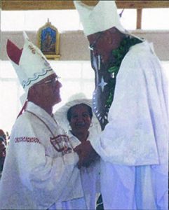 Bishop Stuart O’Connell SM (left) is greeted by Bishop Robin Leamy SM, the ordaining bishop, at Bishop O’Connell’s episcopal ordination