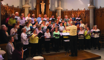 A choral performance in the chapel at La Neylière